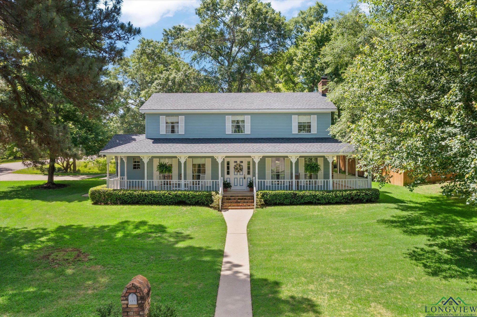 Property Photo: 408 E Forest Dr TX 75693