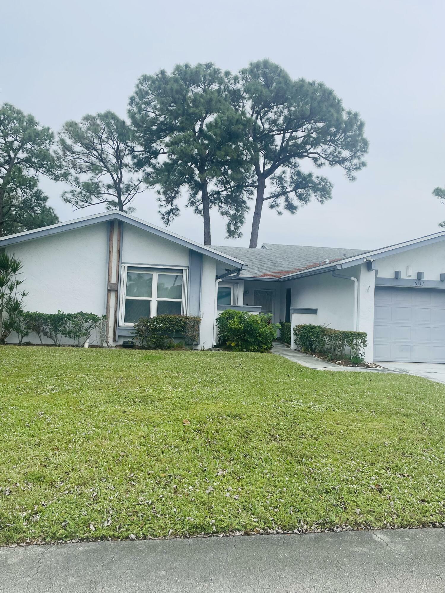 Property Photo:  6111 Elsinore Circle  FL 33463 