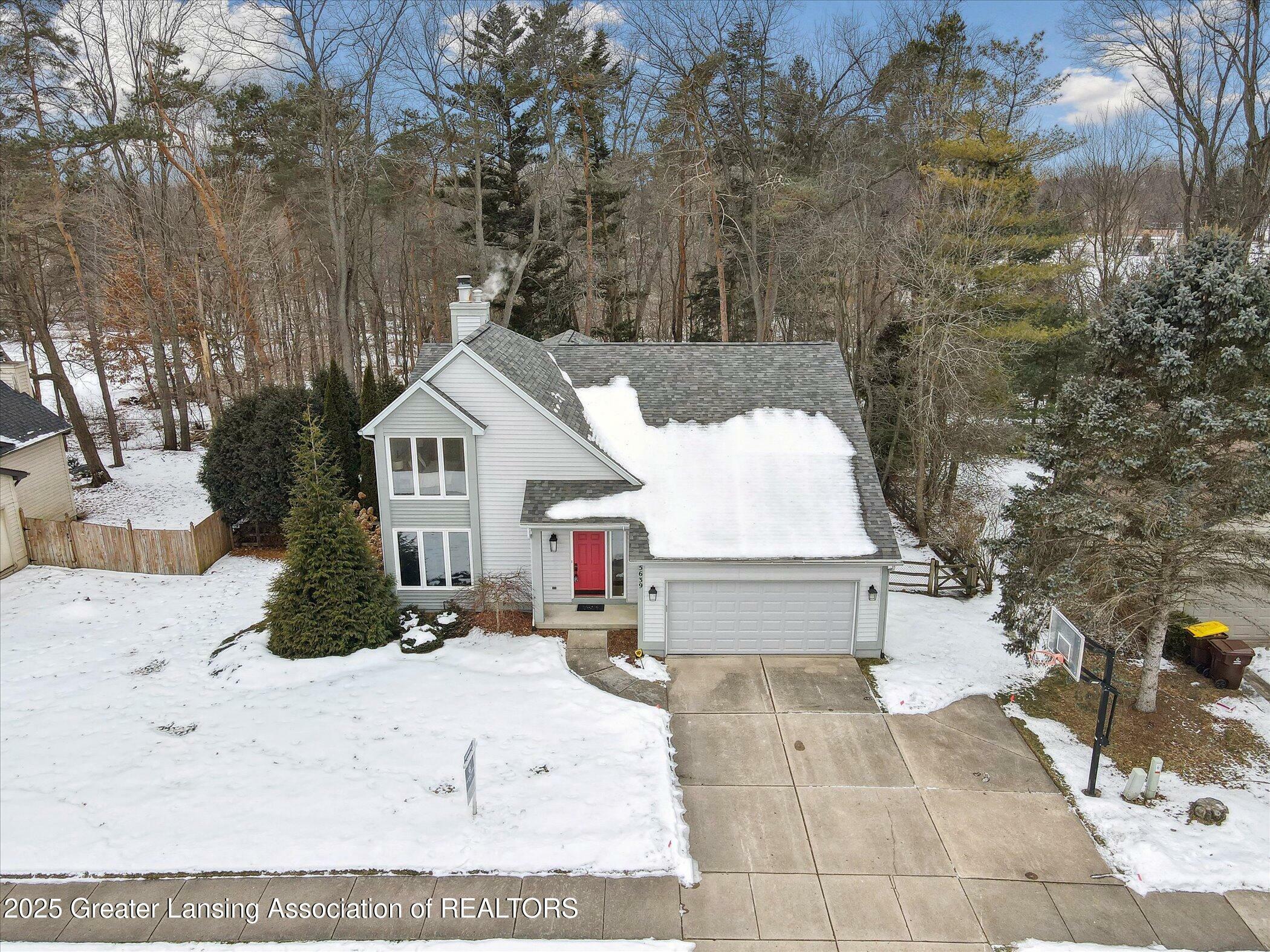 Property Photo:  5639 Creekwood Lane  MI 48840 