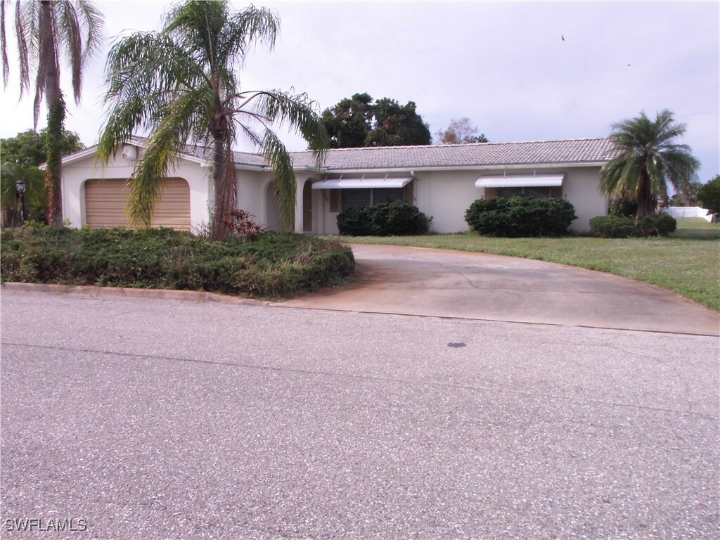 Property Photo:  242 S Lake Drive  FL 33936 