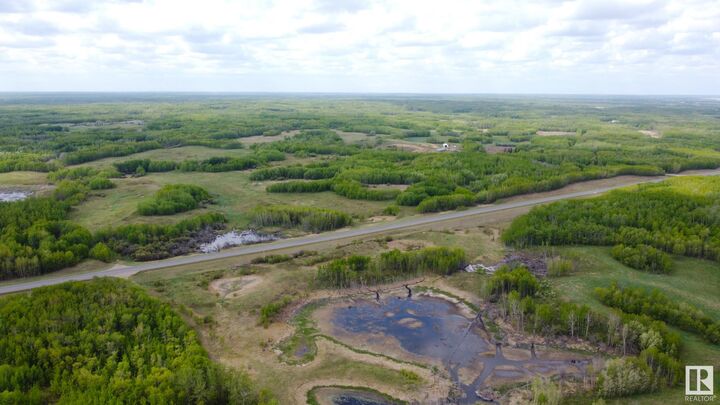 Property Photo: 20255 And 20256 Highway 14 AB T0B 4J0