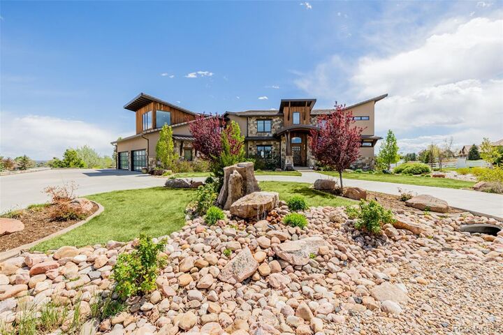 Property Photo:  2466 Spruce Meadows Drive  CO 80023