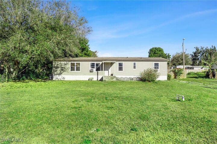 Property Photo:  8405 Nault Road  FL 33917