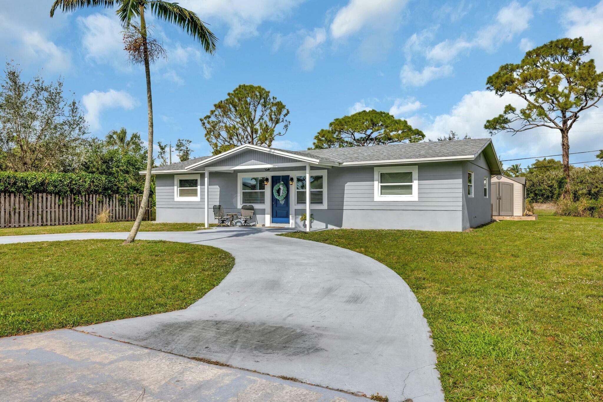 Property Photo:  2143 SE Washington Street N  FL 34997 