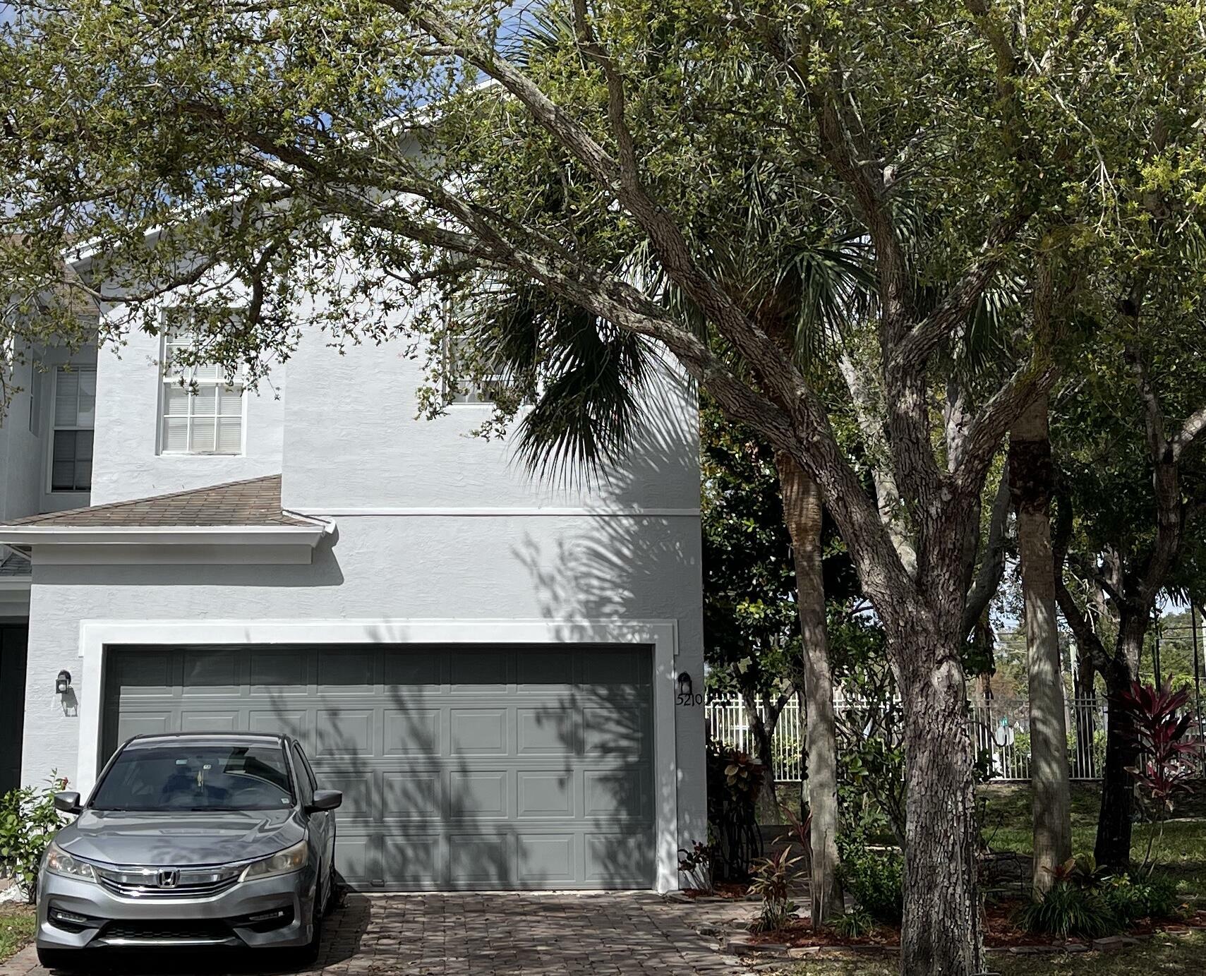 Property Photo:  5210 White Oleander  FL 33415 
