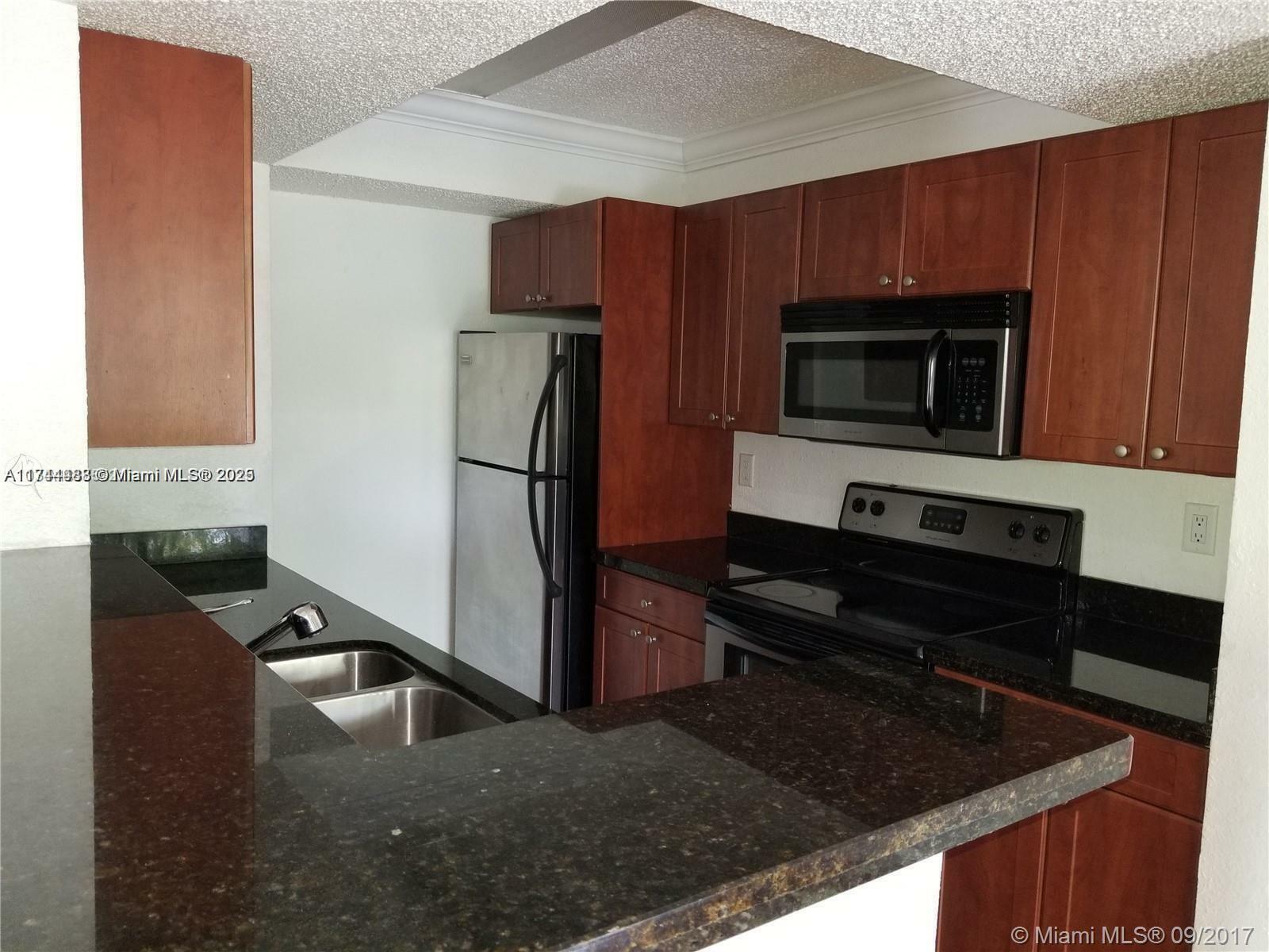 Property Photo:  15650 SW 105th Ln 502  FL 33196 