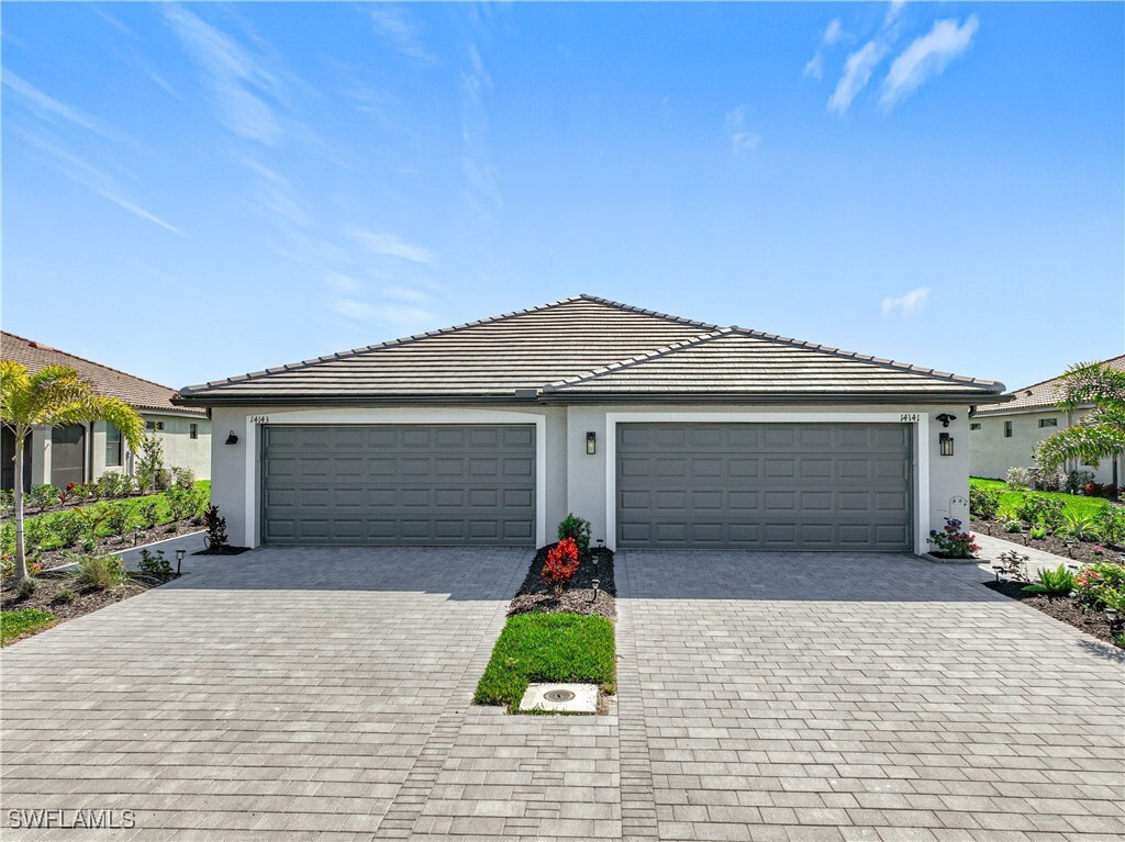 Property Photo:  14143 Winding Cedar Way  FL 33913 