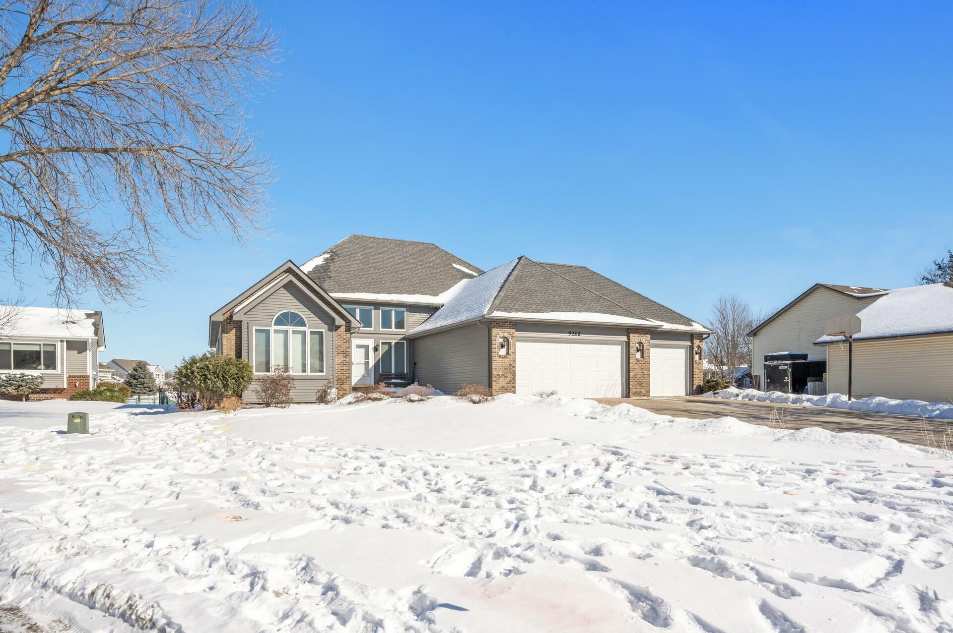 Property Photo:  9212 Queens Gardens N  MN 55443 