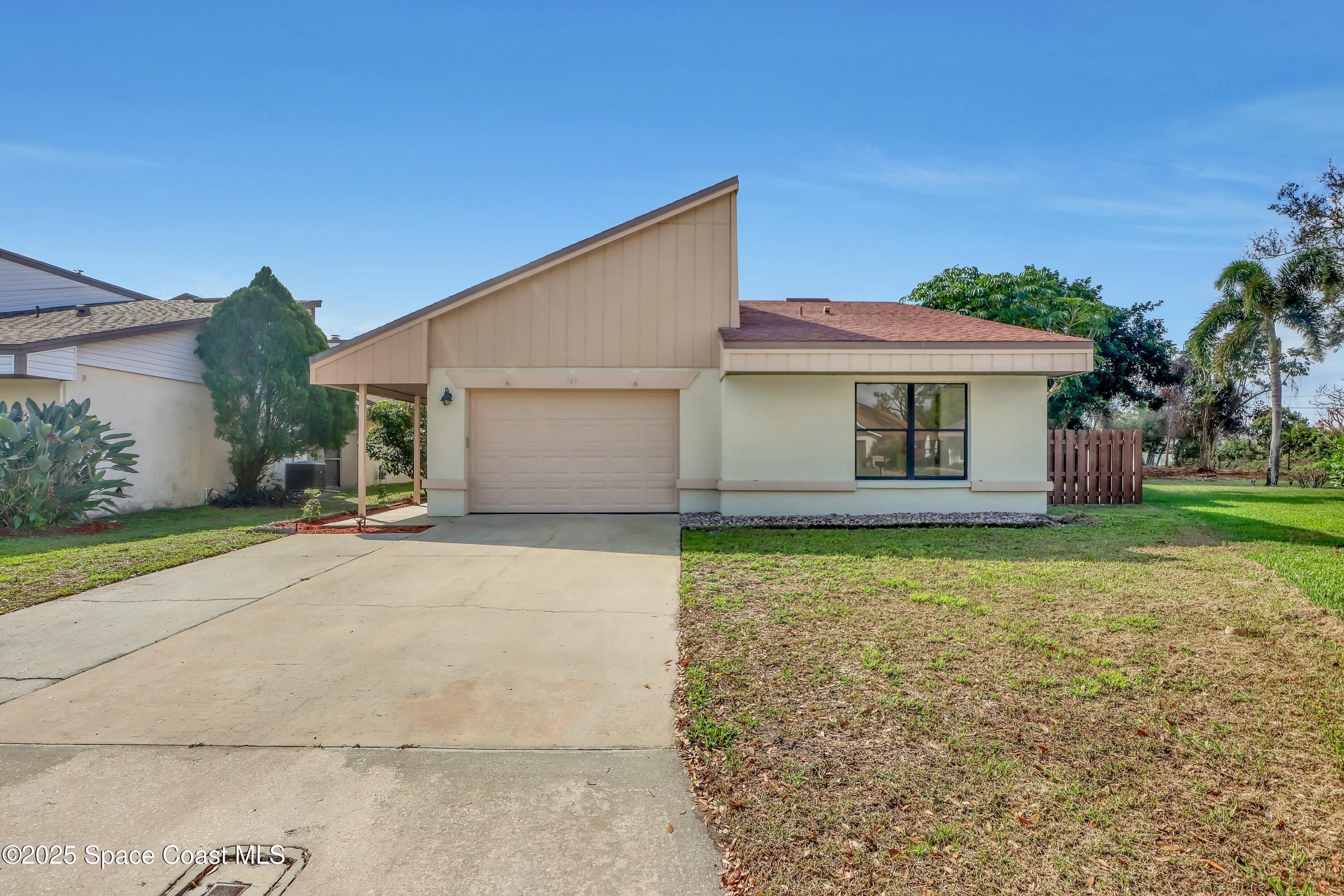Property Photo: 745 Myrtlewood Lane FL 32940