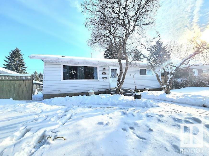 Property Photo:  10543 46 Street NW  AB T6A 1Y4 