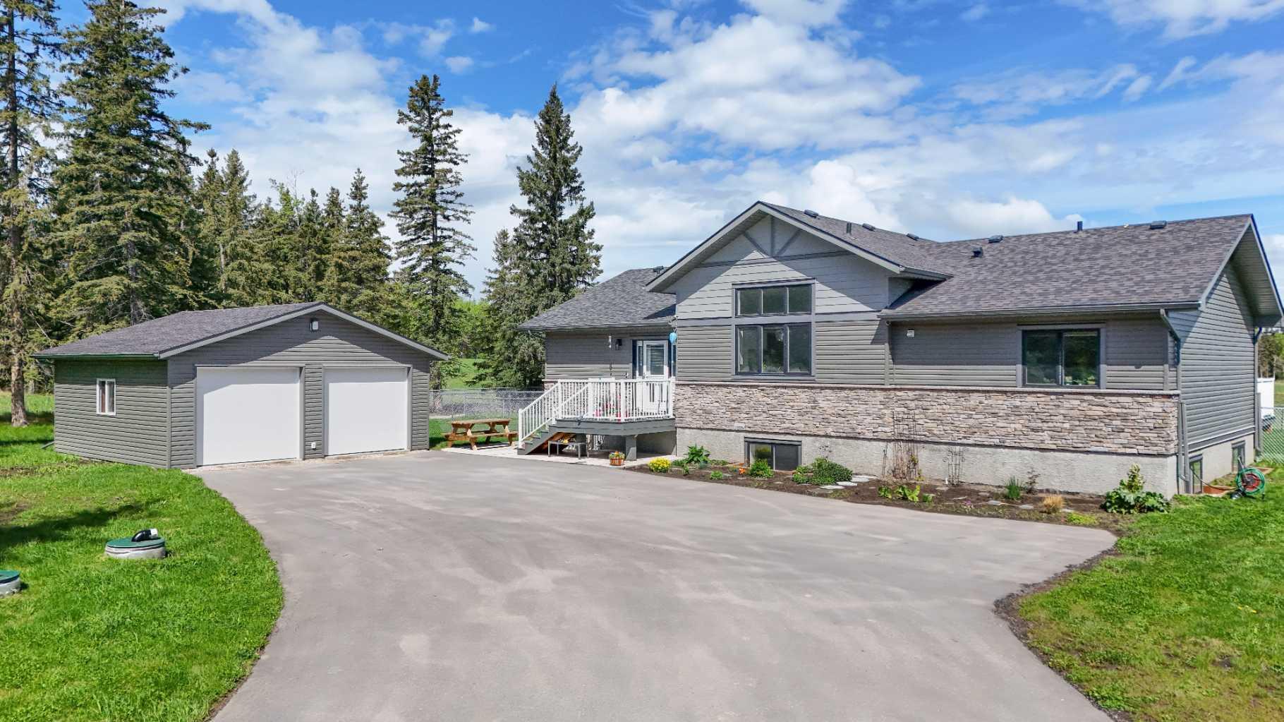Property Photo:  112 Meadow Ponds  AB T4T 1A7 