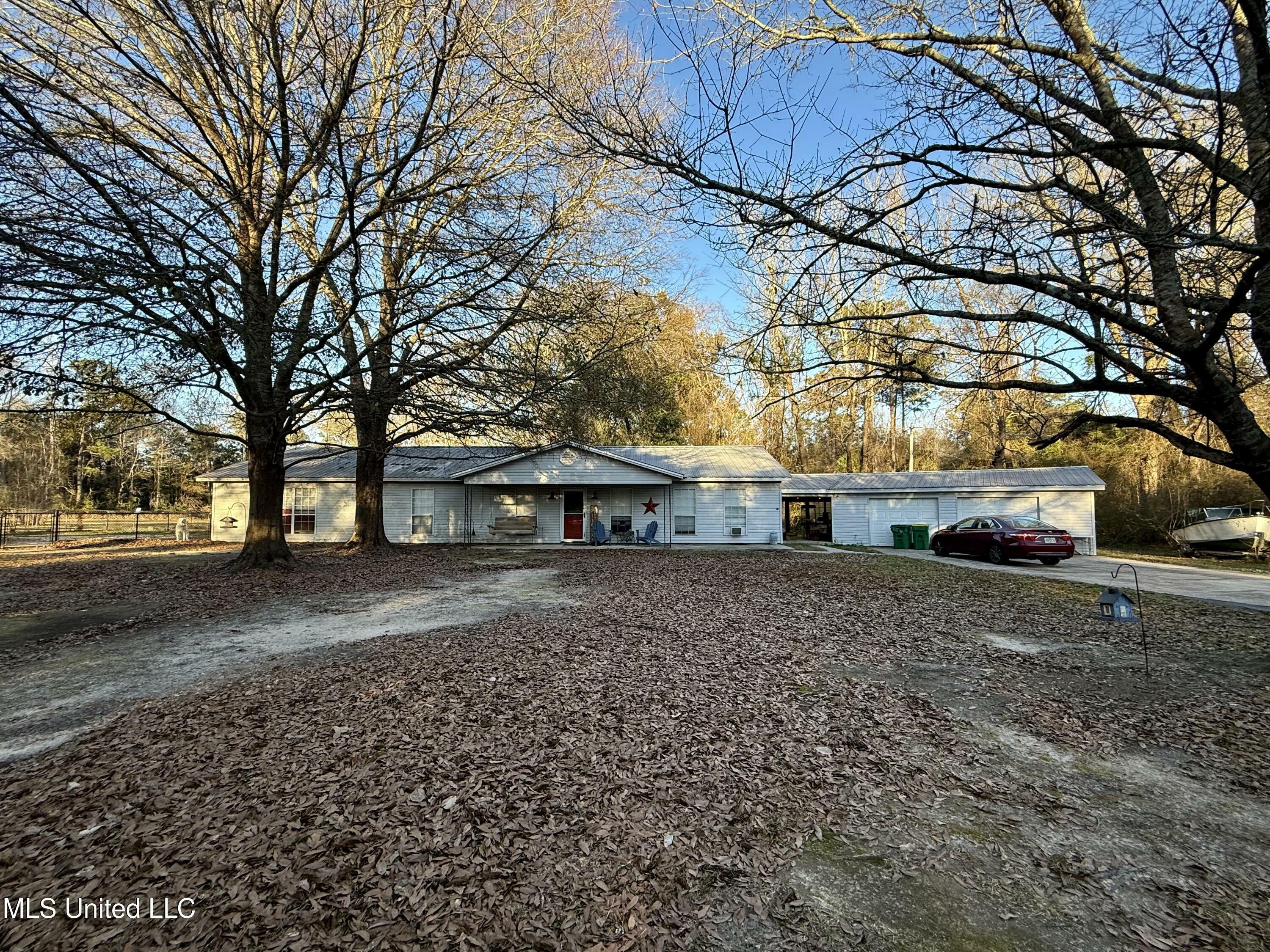 Property Photo:  15304 Old River Road  MS 39565 