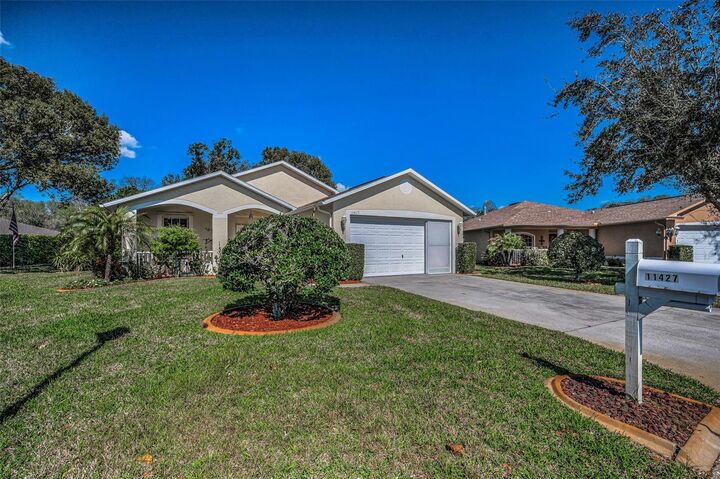 Property Photo:  11427 Turtle Dove Place  FL 34654 