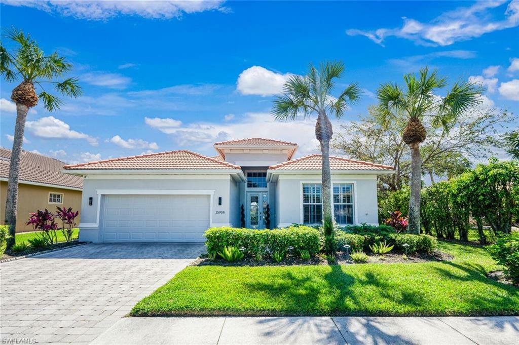 Property Photo: 15958 Delasol Ln FL 34110