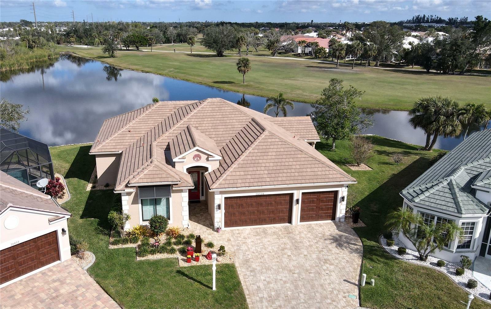 Property Photo: 26034 Feathersound Drive FL 33955