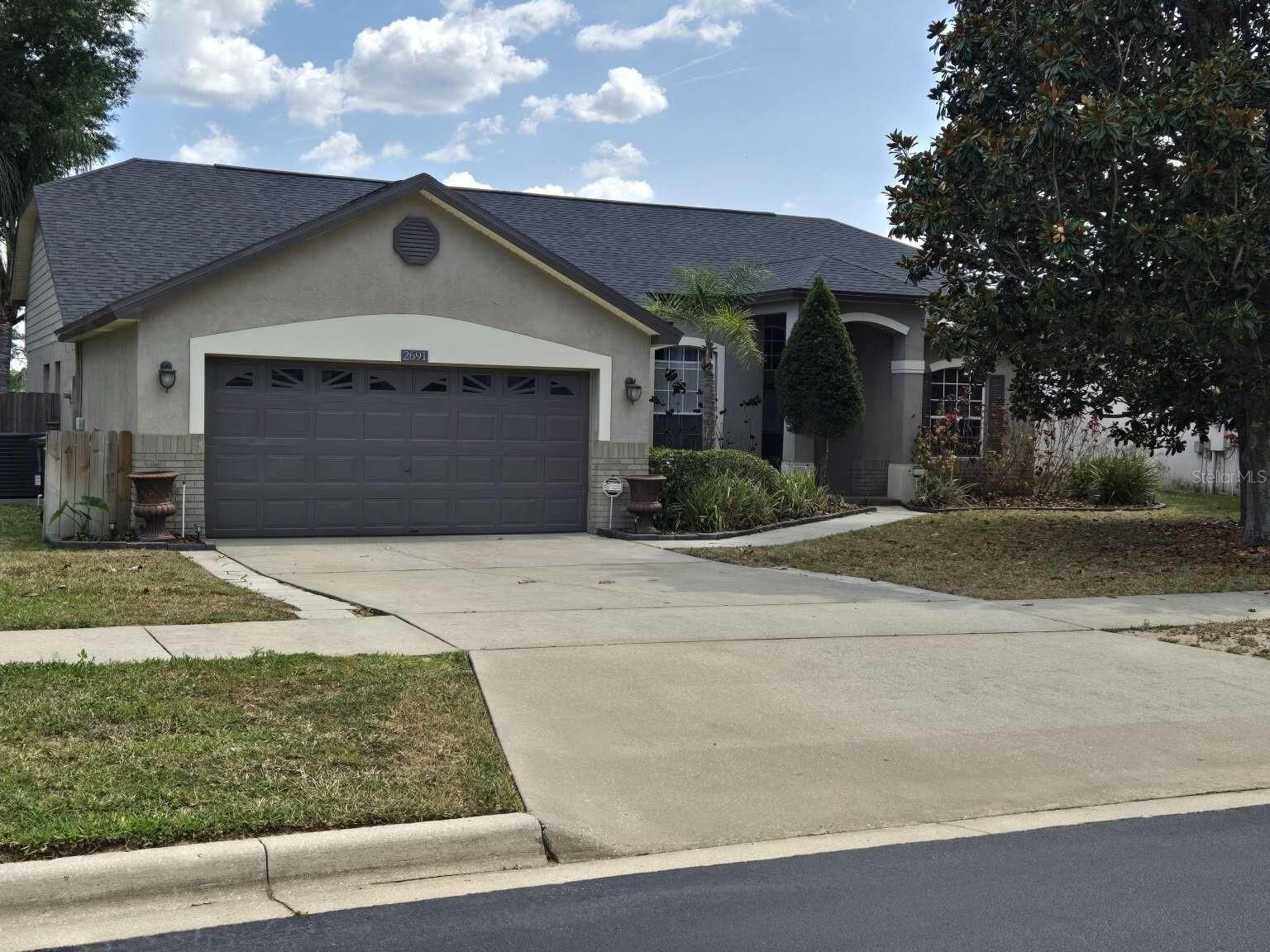 Property Photo: 2691 Cedaridge Circle FL 34711