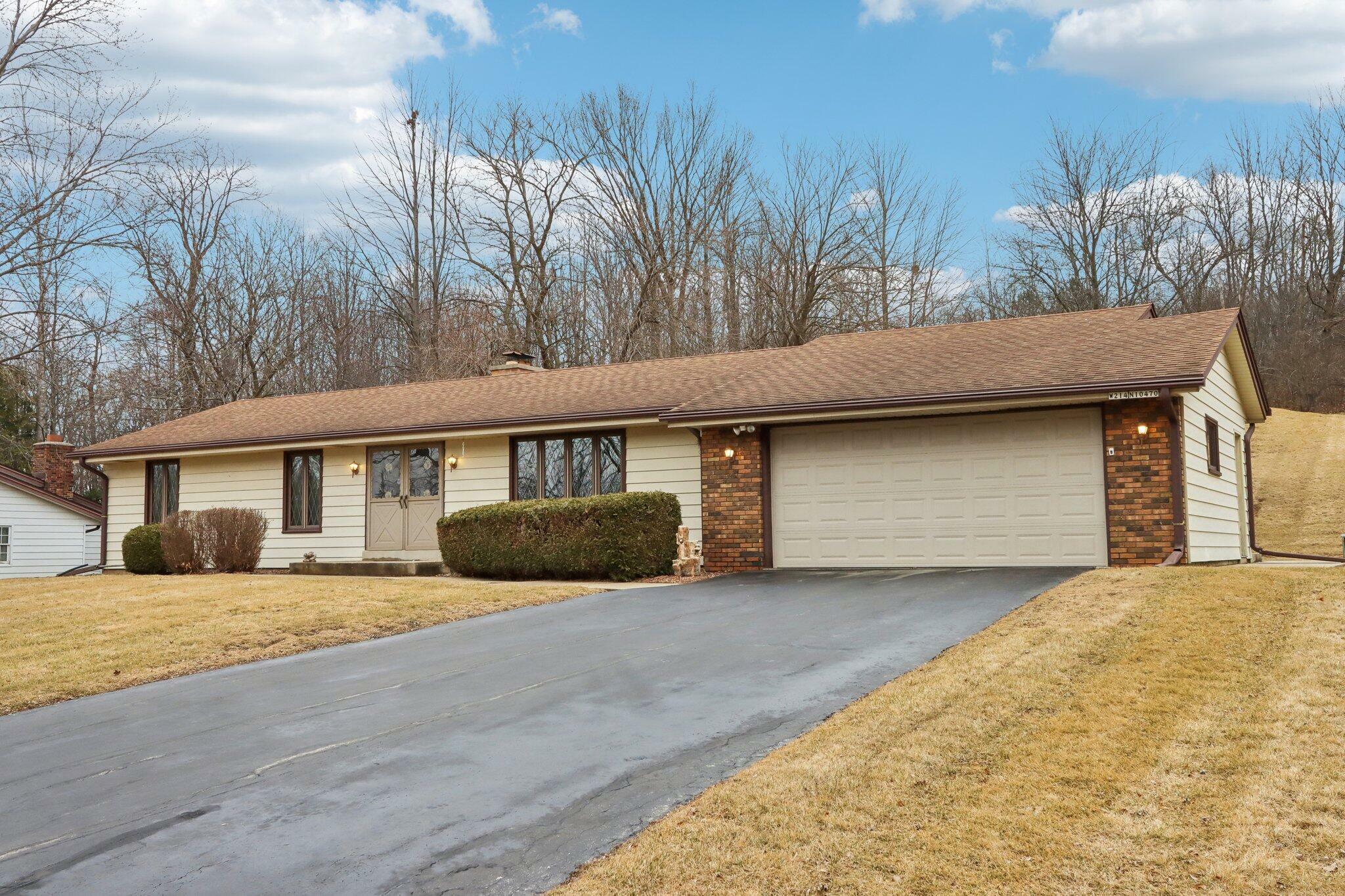 Property Photo:  W214n10470 Oak Ln  WI 53022 