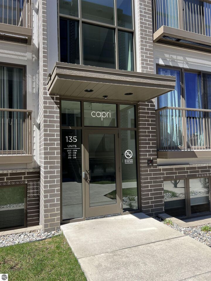 Property Photo: 135 E Eighth Street 211 MI 49684