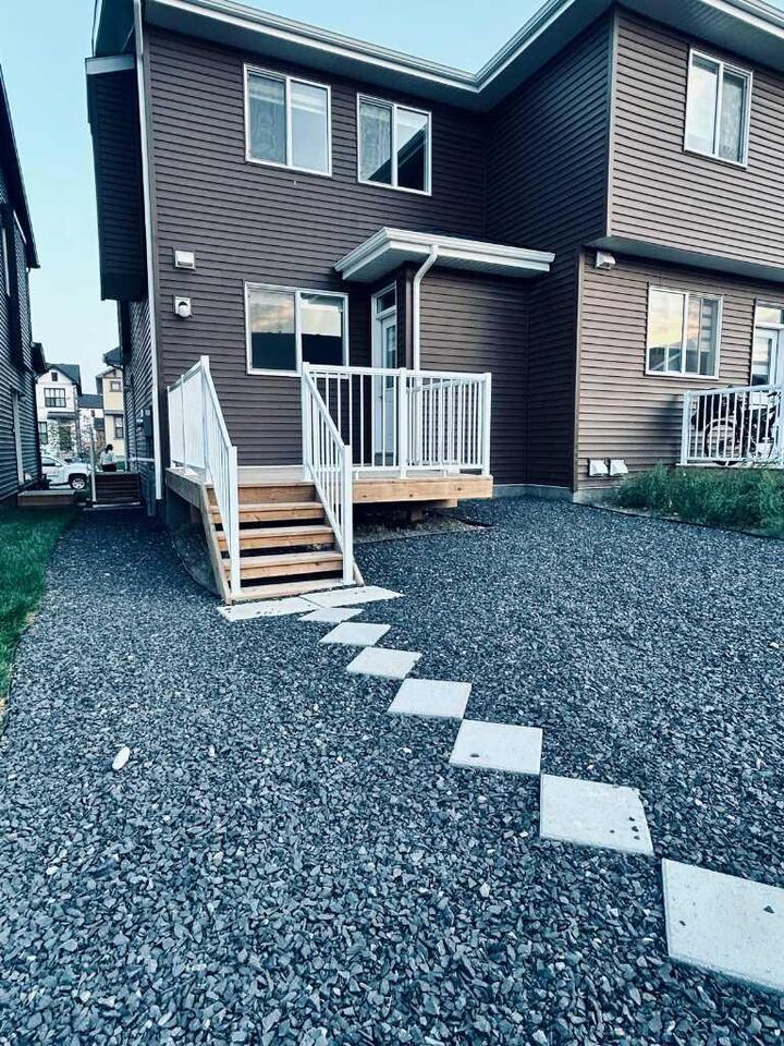 Photo de la propriété: 90 Aquila Drive NW AB T3R 2C4