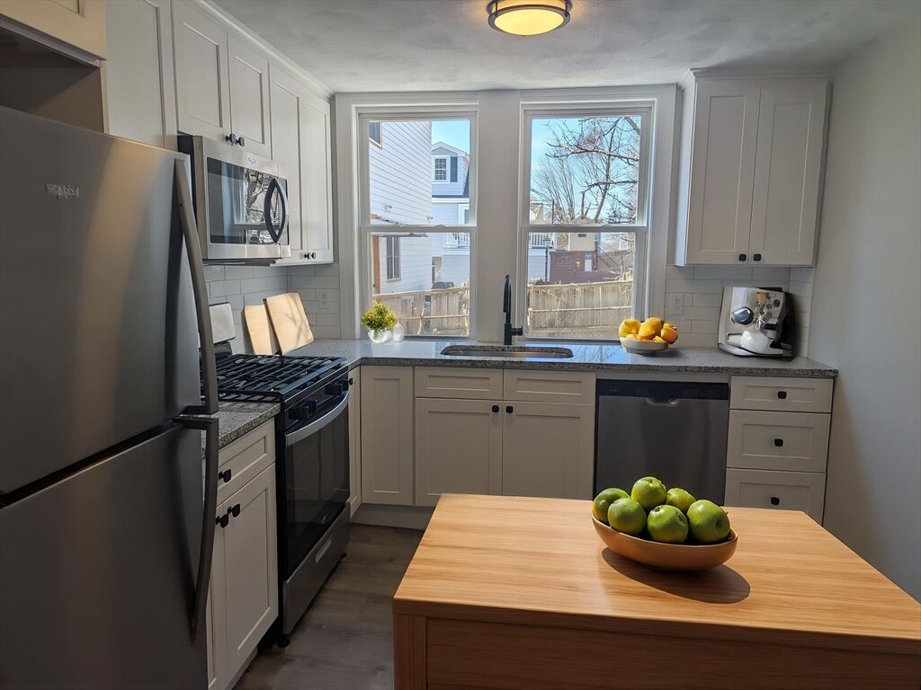 Property Photo:  44-46 Locust Street #1  MA 02152 