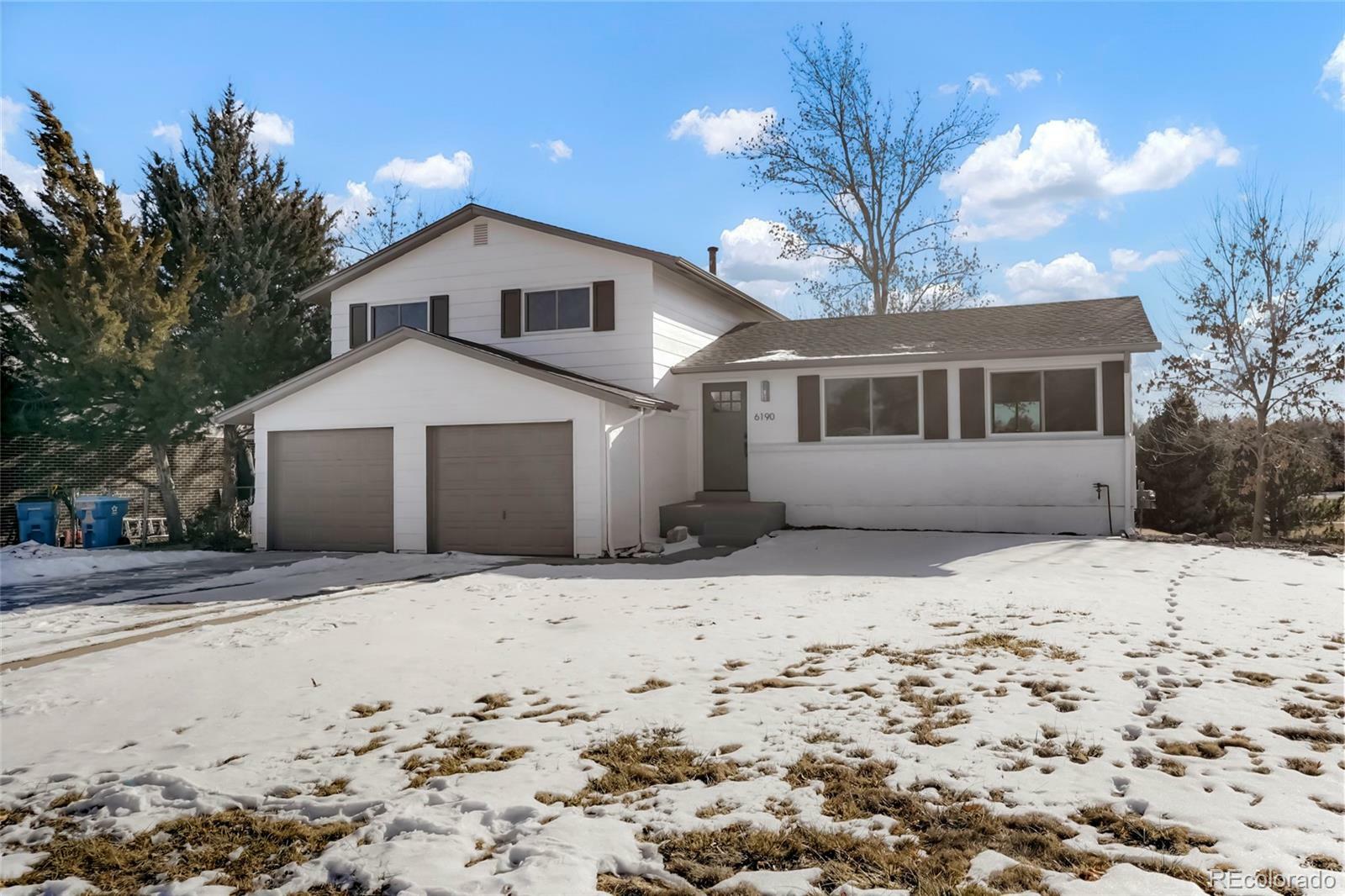 Property Photo: 6190 W Canyon Avenue CO 80128