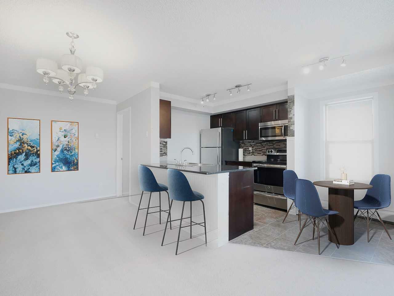 403 Mackenzie Way SW 9416  Airdrie AB T4B 3V7 photo