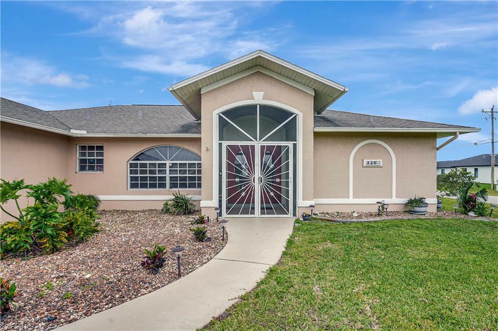 Property Photo: 326 NW 5th St FL 33993
