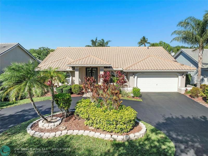 Property Photo:  5624 NW 87th Way  FL 33067 