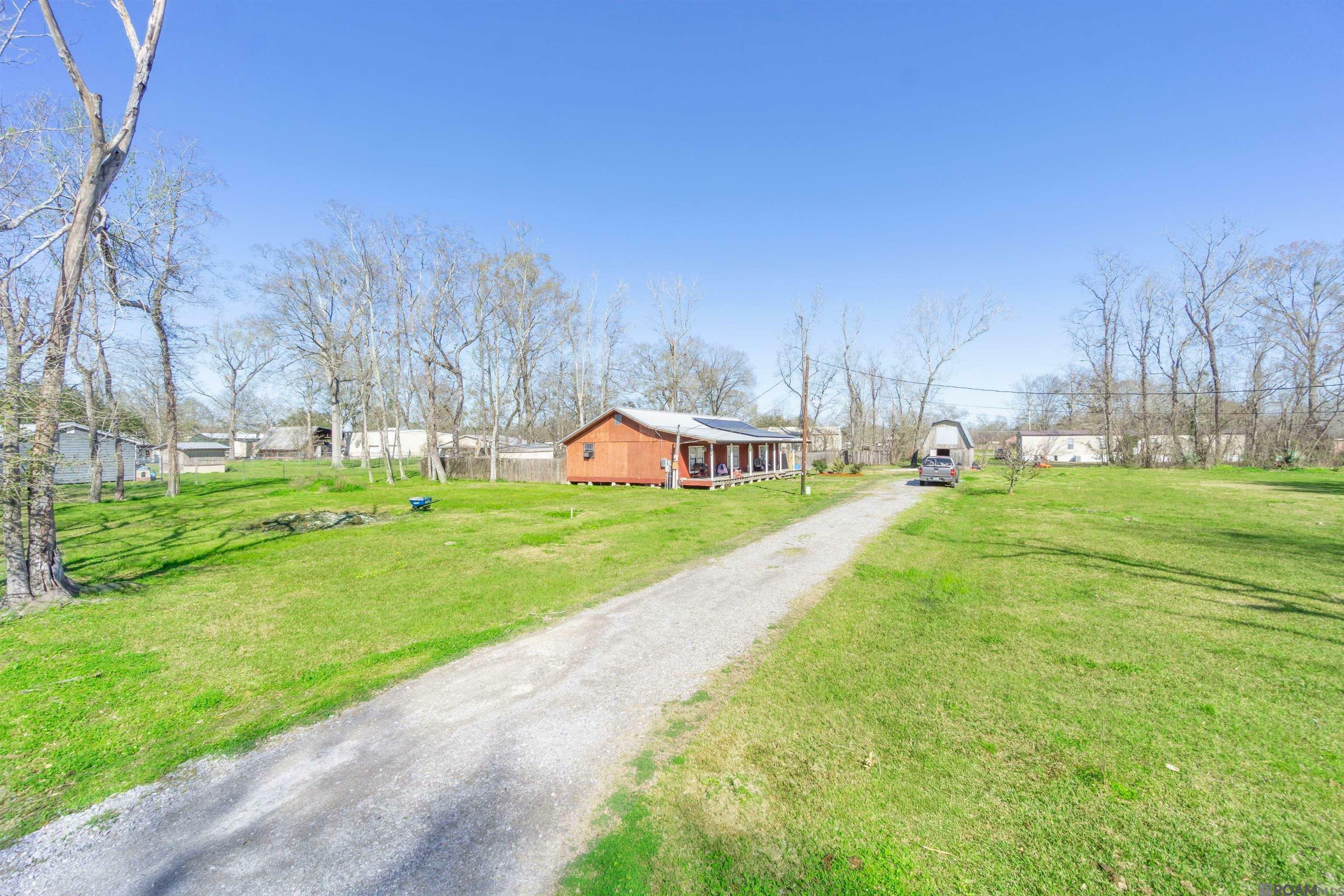 Property Photo: 14098 Adam Arceneaux Dr LA 70737