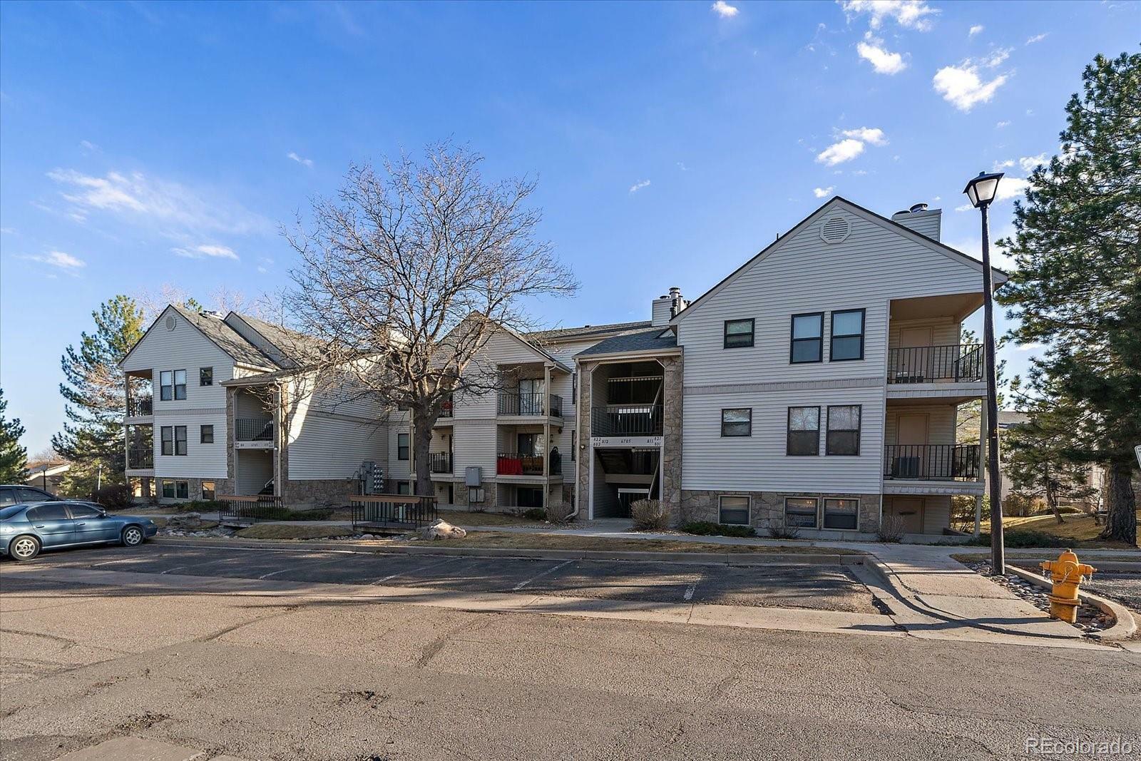 Property Photo:  6705 S Field Street 801  CO 80128 