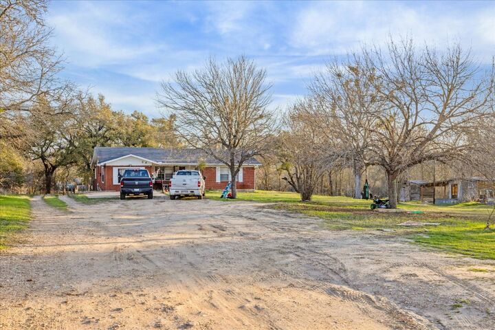 Property Photo:  4975 E Highway 71 Highway E  TX 78617 
