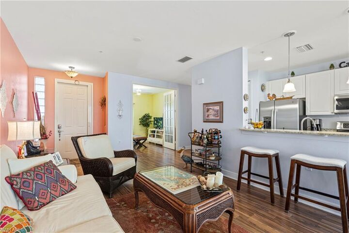 Property Photo:  1330 Sweetwater Cv 102  FL 34110 