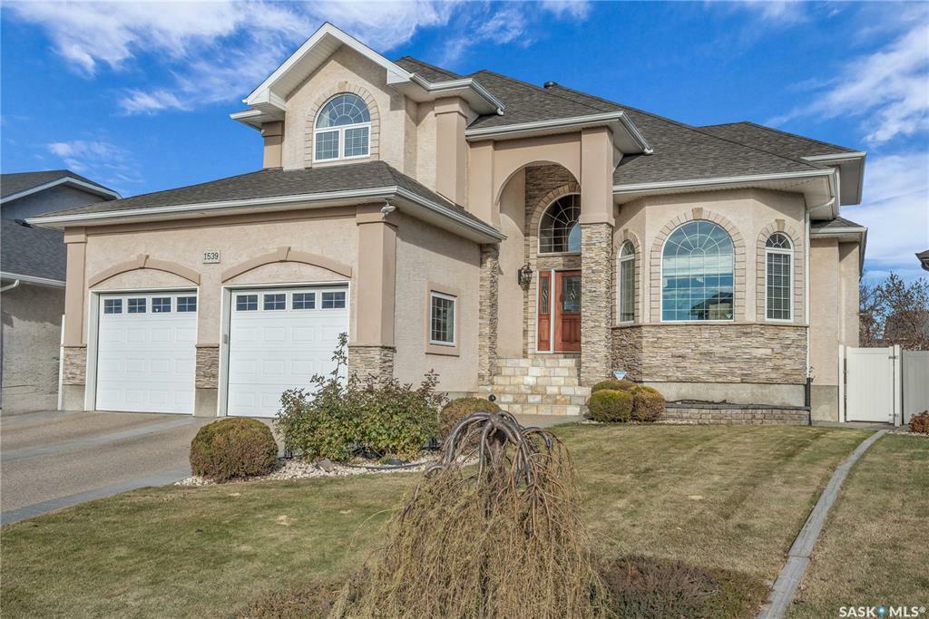 Property Photo: 1539 Lakeridge Drive N SK S4X 4L5