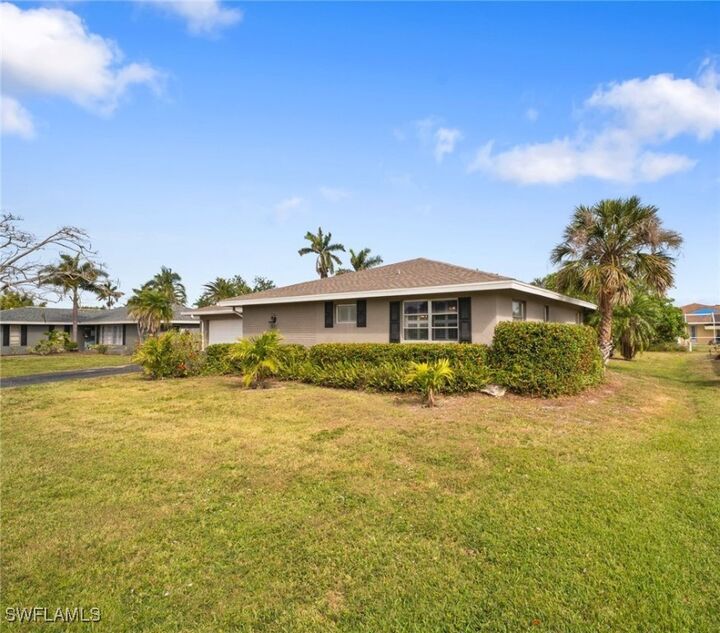 Property Photo: 1557 Woodwind Court FL 33919