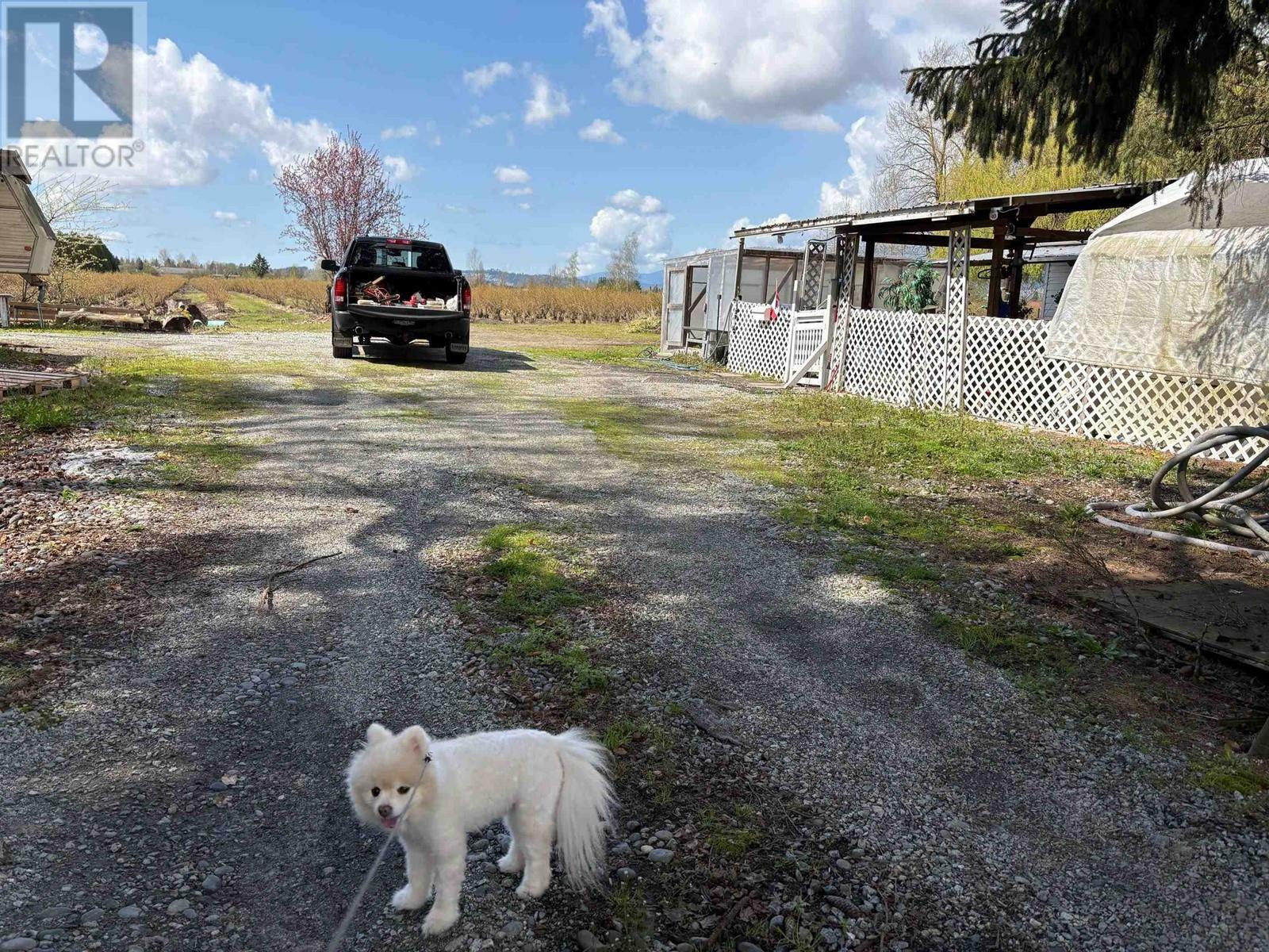 Property Photo:  12853 Harris Road  BC V3Y 2S1 