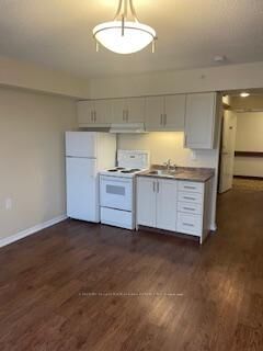 Photo de la propriété:  1056 Queens Avenue 510  ON L6H 6R3 