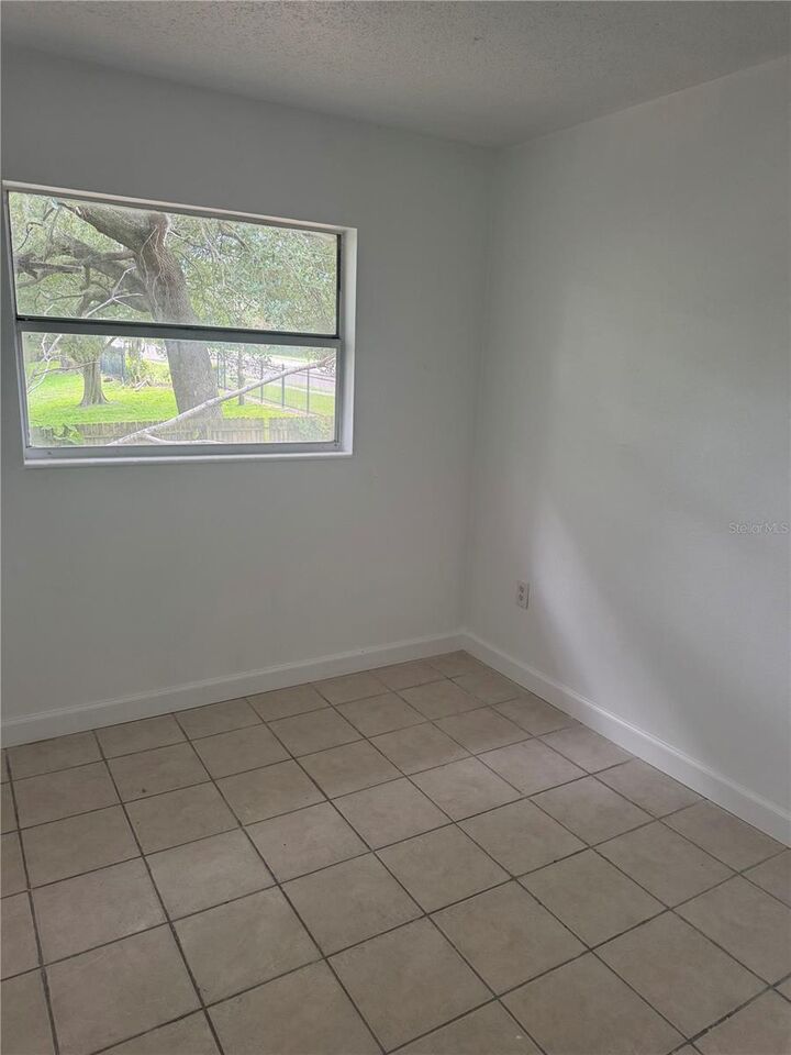 Property Photo:  4883 N Pine Hills Road  FL 32808 
