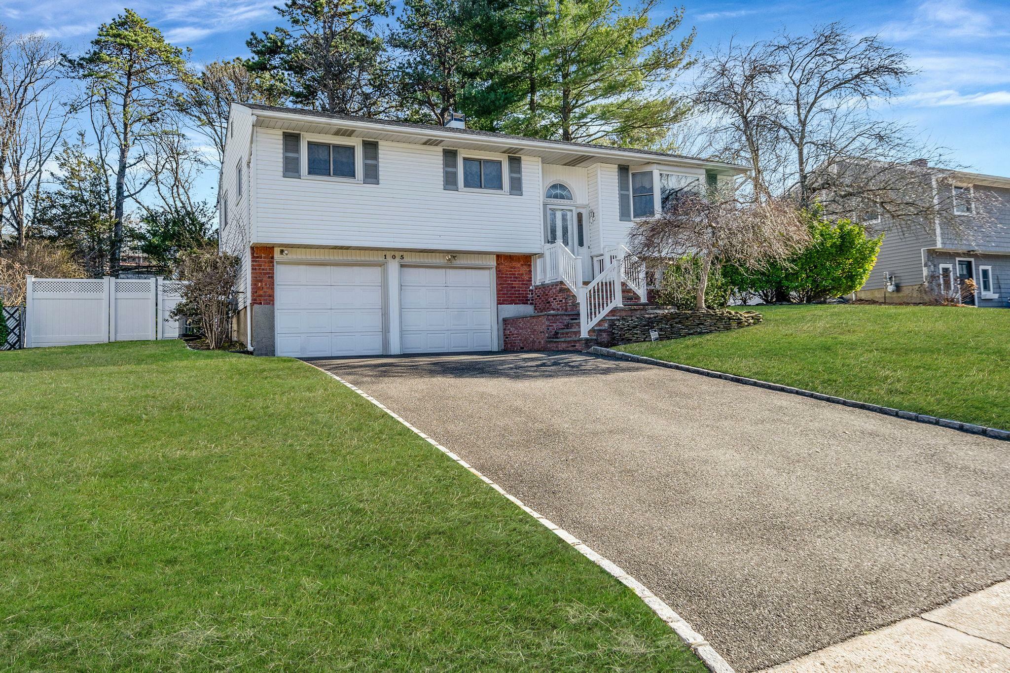 Property Photo: 105 Morewood Drive NY 11787