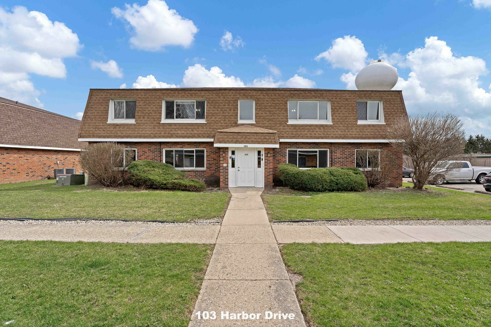 Property Photo: 103 Harbor Drive D IL 60543