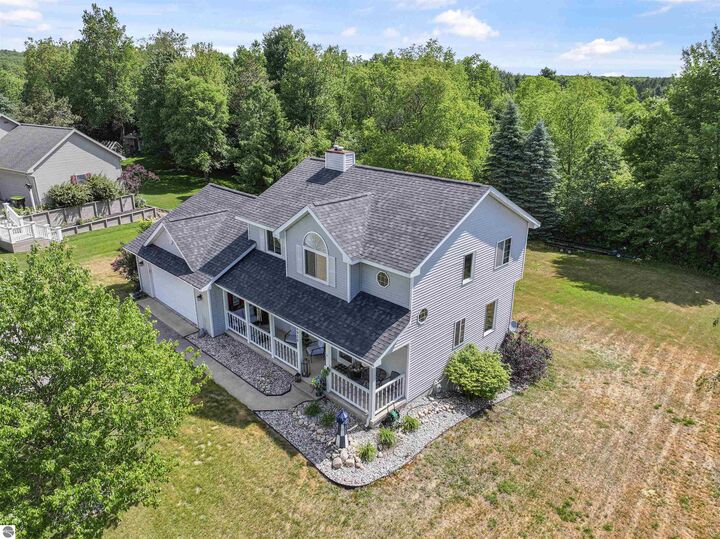 Property Photo:  8956 Lamplighter Lane  MI 49601 