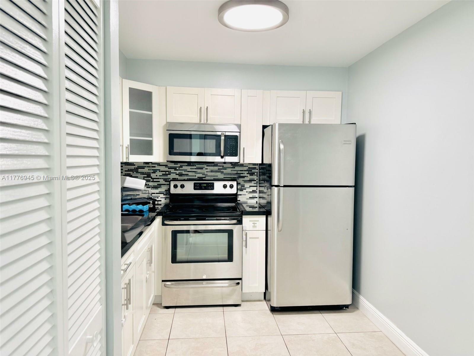 Property Photo:  2055 SW 122nd Ave 220  FL 33175 