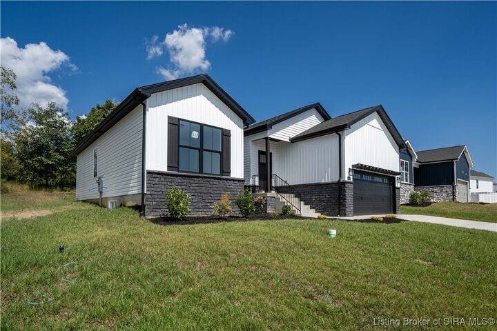 Property Photo:  2222 Pine Tree Lane Lot#112  IN 47143 