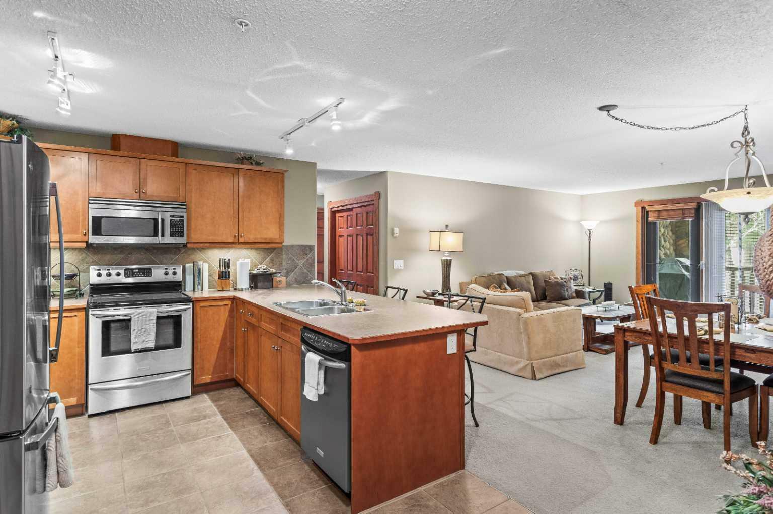 Property Photo: 150 Crossbow Place 206 AB T1W 3H5
