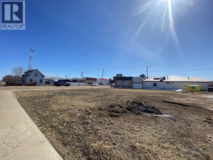 Property Photo:  305307 1 Street West  AB T0J 1P0 