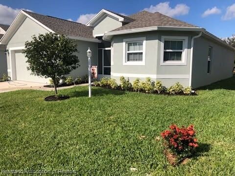 Property Photo:  648 W Carmichael Street  FL 33825 