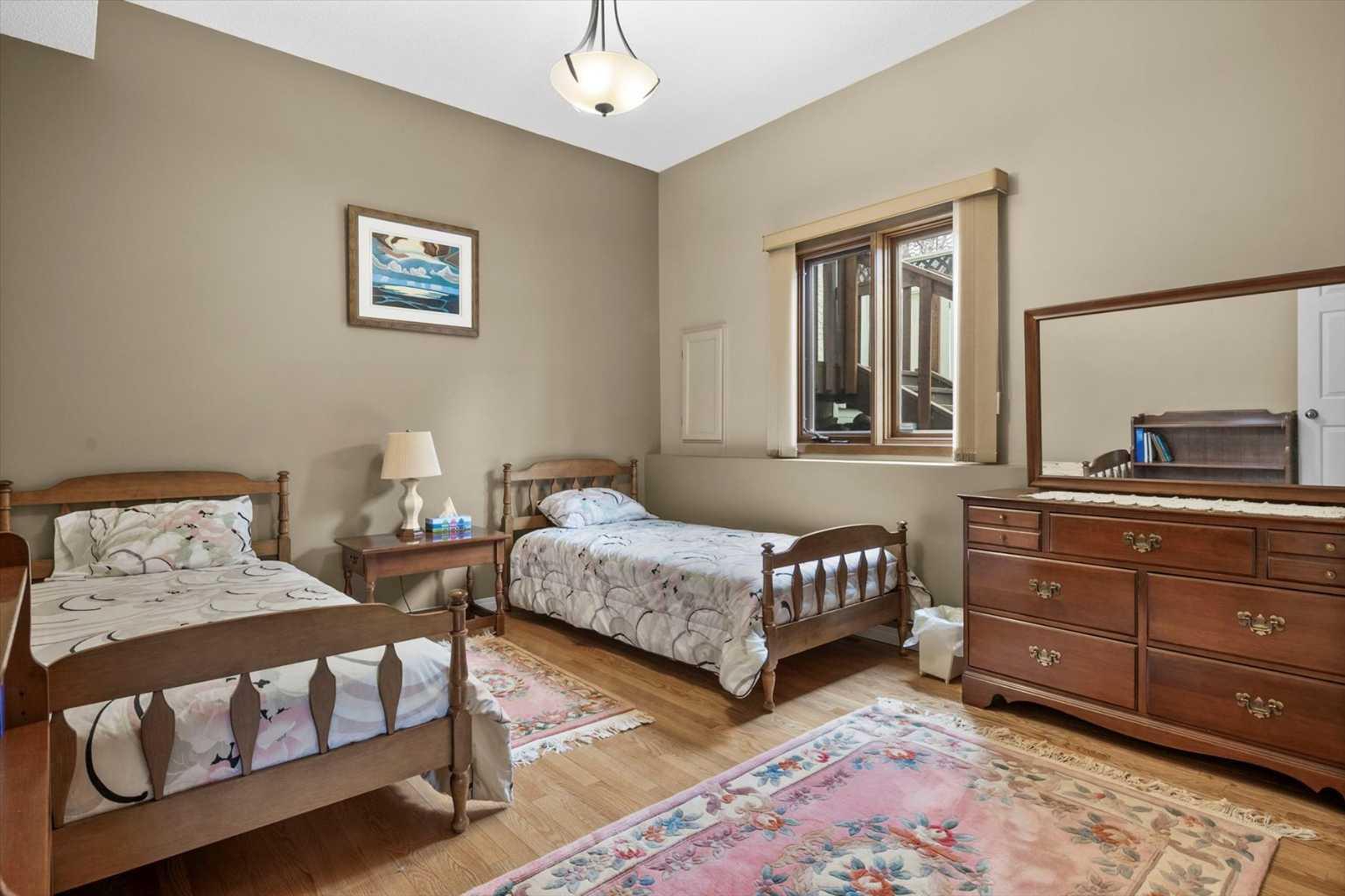 Property Photo: 12 Strathaven Mews SW AB T3H 2G2