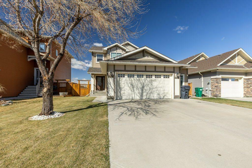 Property Photo: 679 Marie Van Haarlem Crescent N AB T1H 6Y9