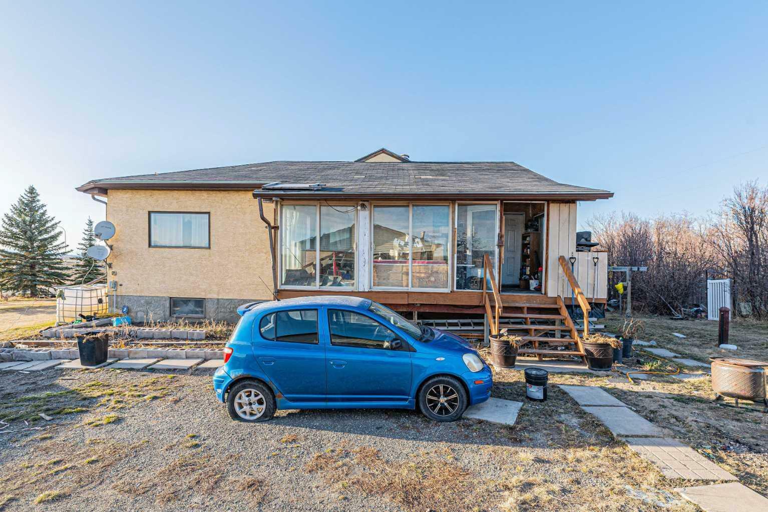 Property Photo: 266110 1014 Drive E AB T1S 4S5