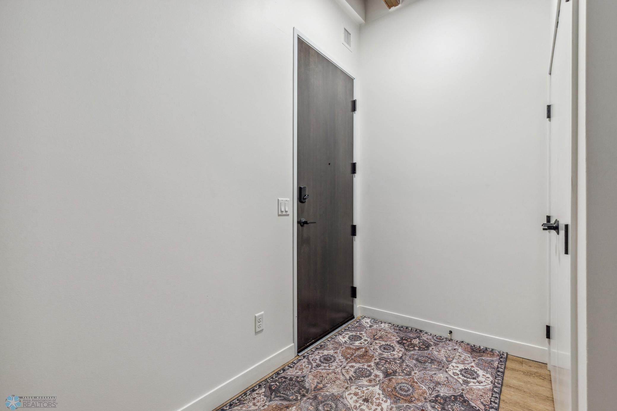 Property Photo: 117 Broadway N 302 ND 58102