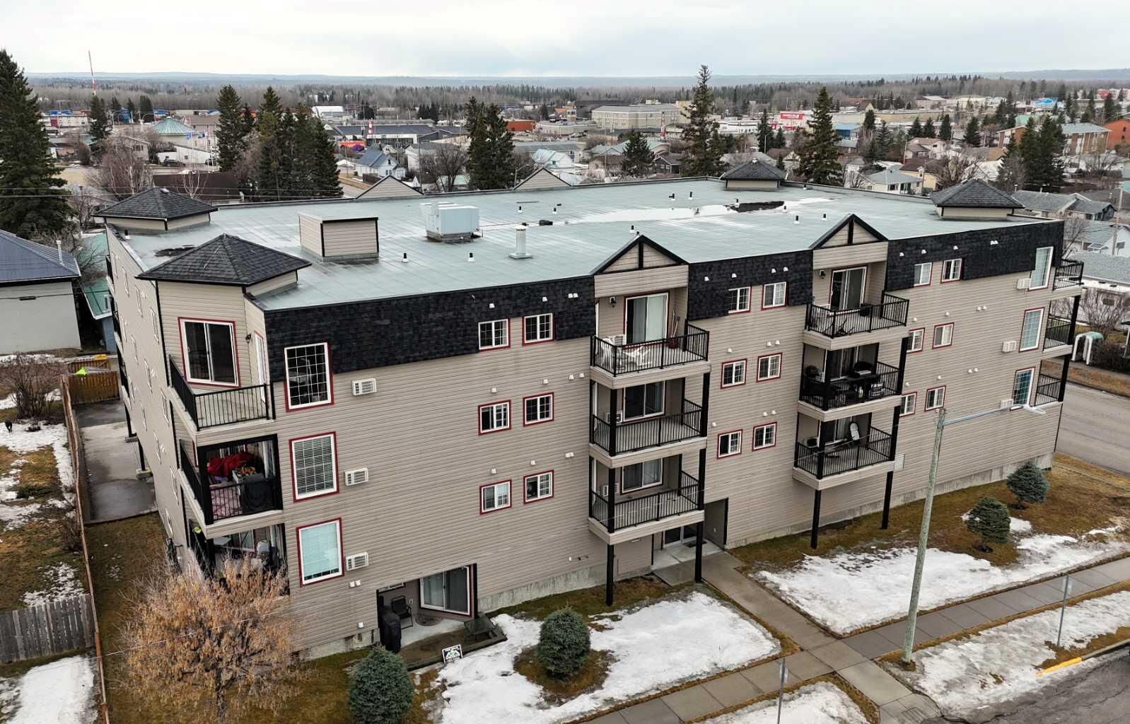 Property Photo: 5037 7 Avenue 406 AB T7E 0A8